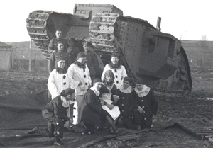 Performers in Front of a Tank